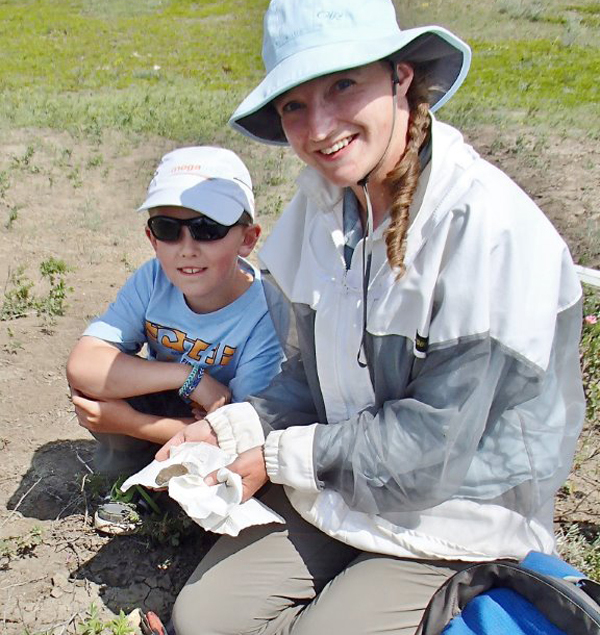 Local volunteers and students help with the collection at the Herschel Marine Bonebed in 2014.